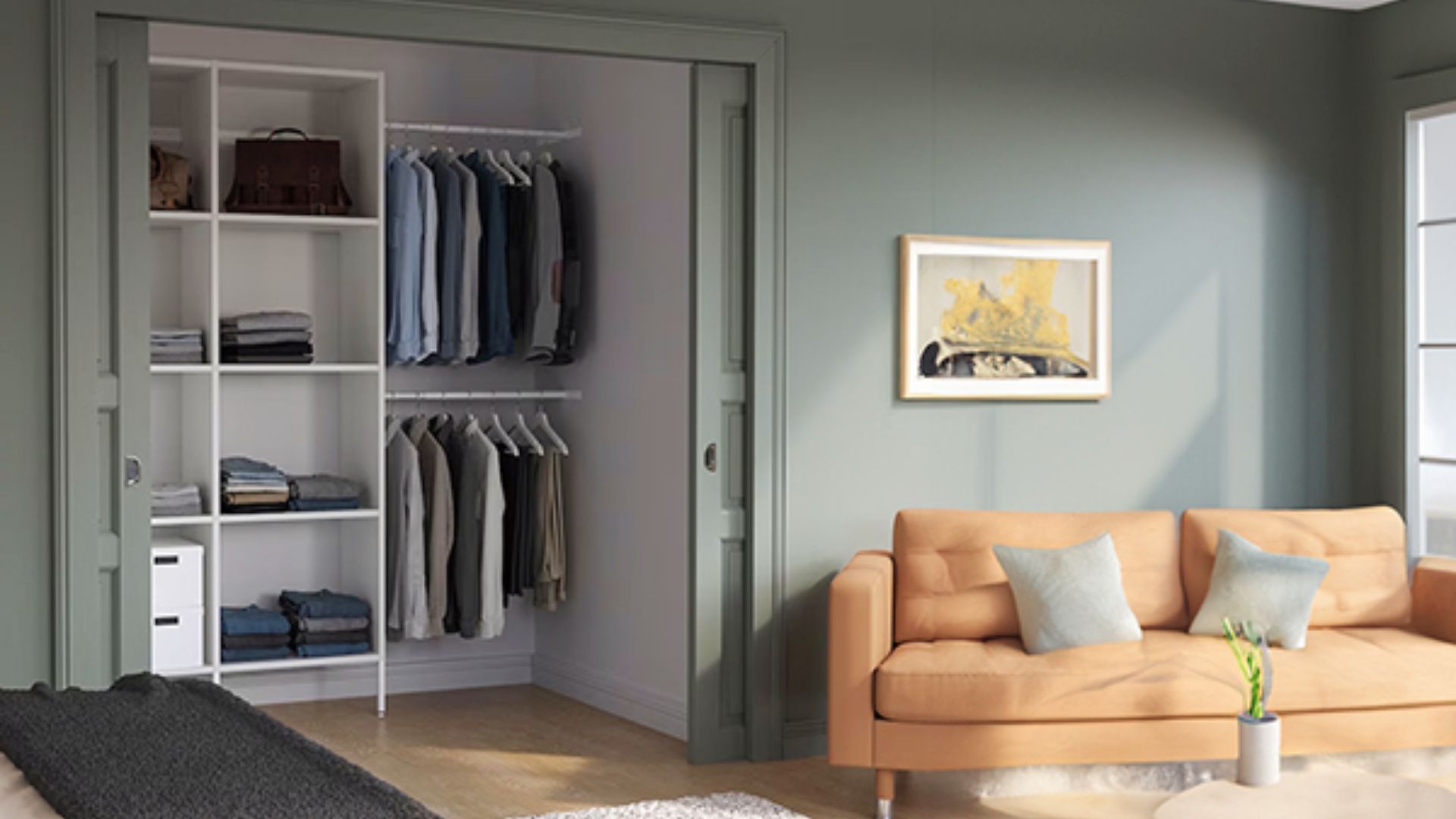 Modern bedroom with double closet rods installed at standard heights in a sage green reach-in closet.