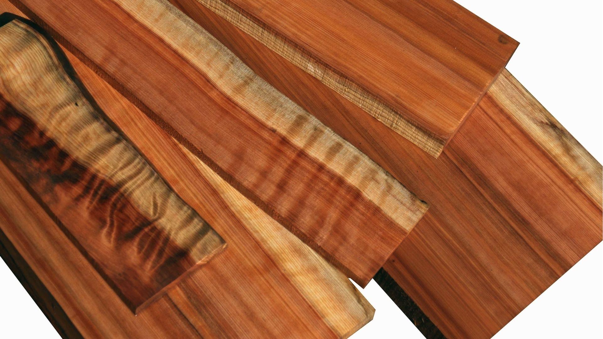 Curly redwood boards with figured grain, lightweight aromatic wood for upscale closet shelves